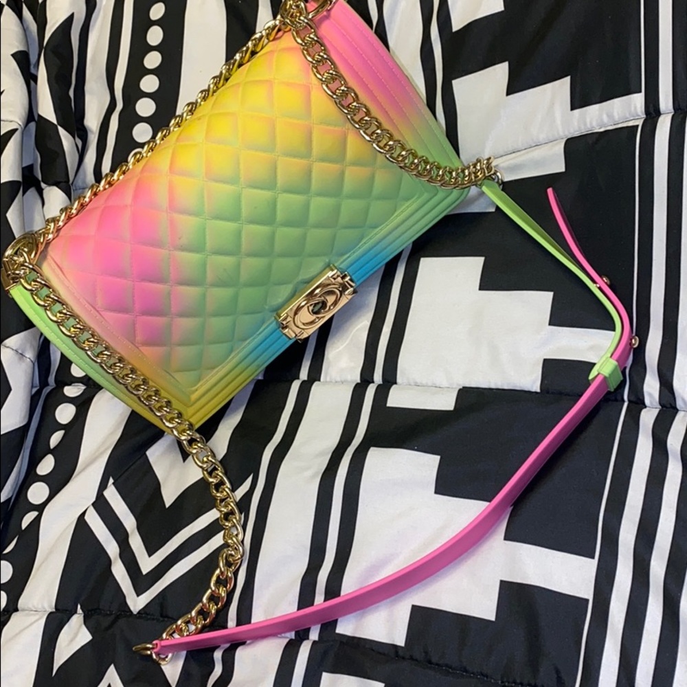A rainbow purse similar to a Chanel purse